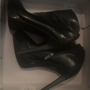 Steve Madden Sleek Black Heeled Boots